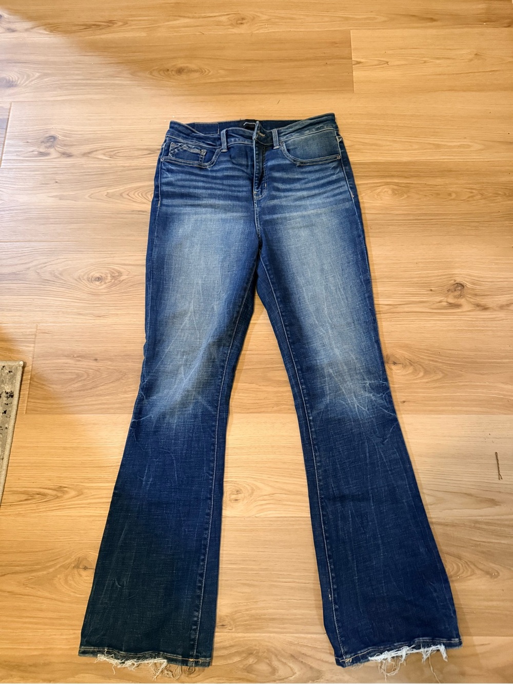 Buckle Indigo Blue Flare Jeans with Raw Hem